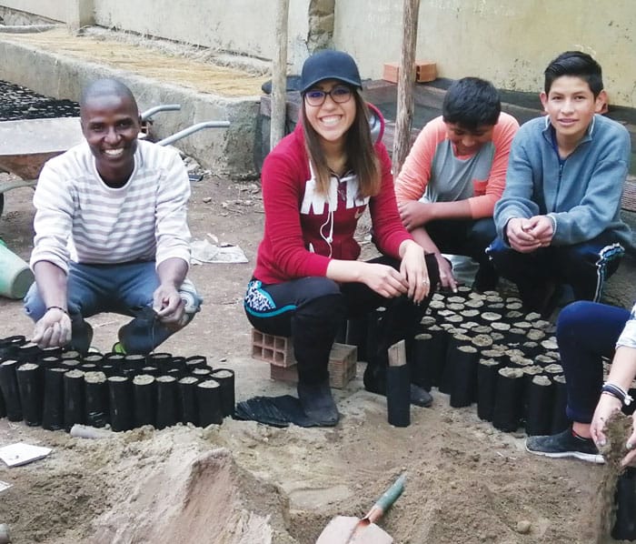 Charles Ogony helps with a reforestation project in Cochabamba, Bolivia. 