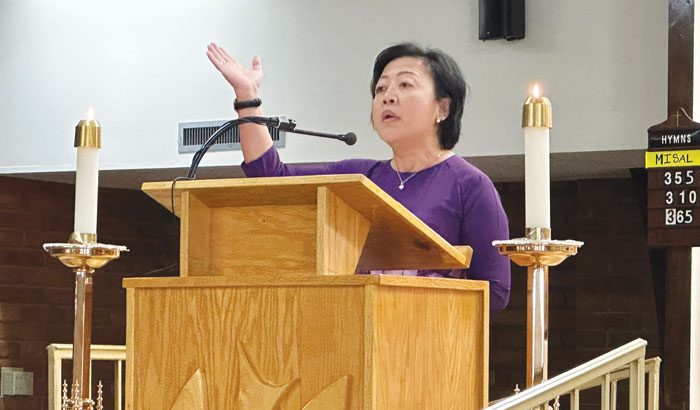 New Maryknoll Lay Missioner Julienne “T.T.” Hoang, a cantor, leads the responsorial psalm sung in English and Vietnamese. (Courtesy of Maryknoll Lay Missioners/U.S.)