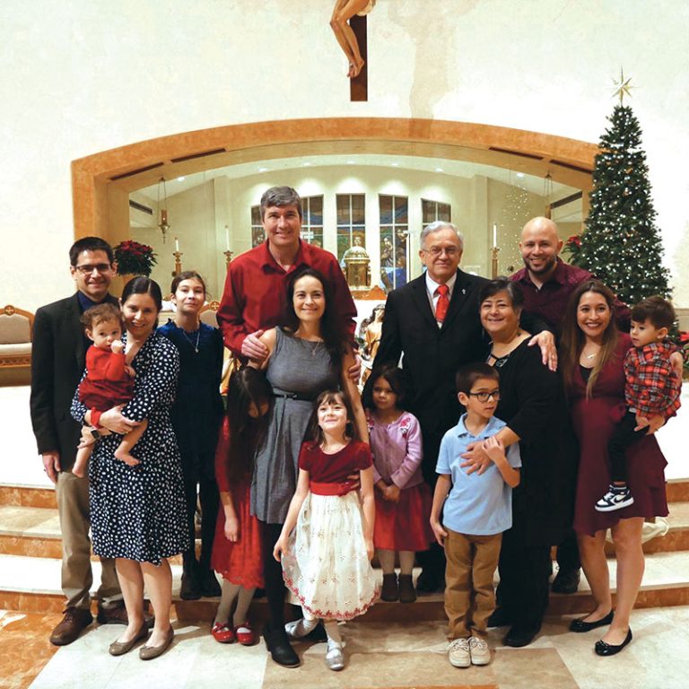The Monterrubios gather for Christmas Mass at Saint Paul the Apostle Church. 