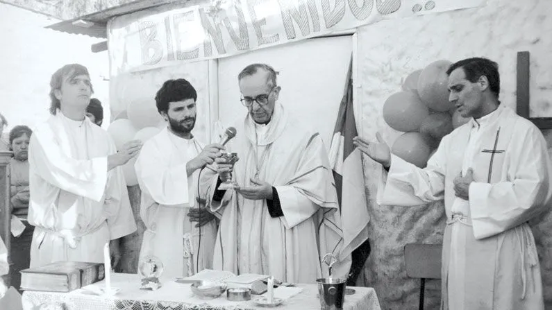 The Most Reverend Jorge Mario Bergoglio, then archbishop of Buenos Aires, Argentina, is seen celebrating Mass at the Villa 21-24 slum in 1998. 