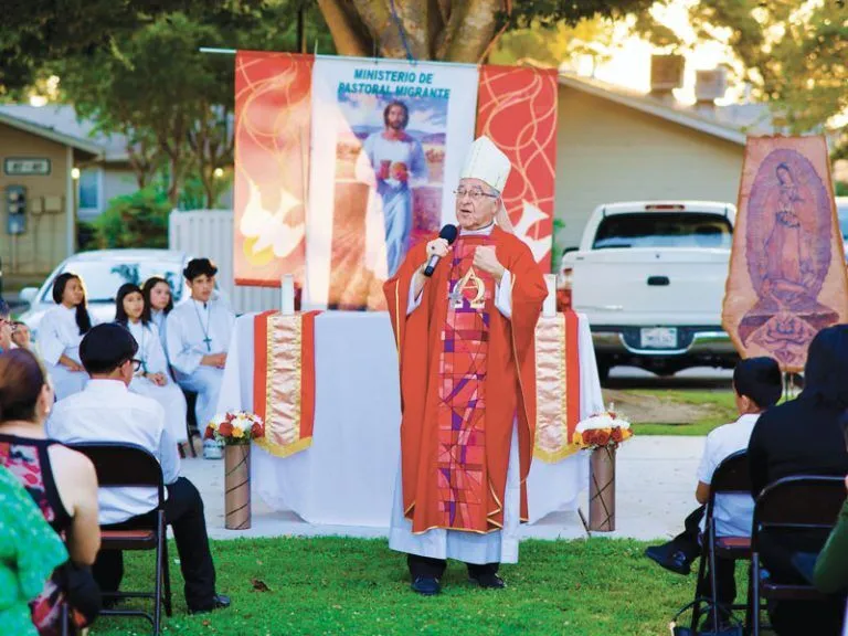 Bishop Myron J. Cotta of the Diocese of Stockton, California, presides at a Confirmation Mass for farmworker teenagers and young adults. 