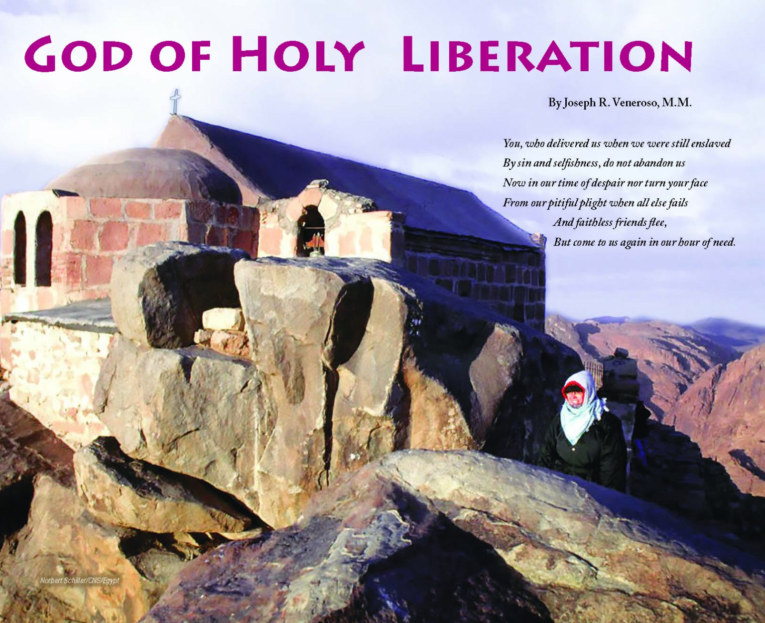 A person hikes up the last stretch of a trail to the stone and brick church that sits atop a a high mountain.