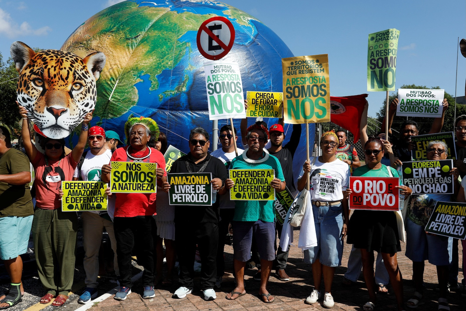People attend a protest in Belem, Brazil, July 23, 2025, advocating for climate justice months ahead of U.N. Climate Change Conference, COP30, that Belem will be hosting in November. (OSV News/Wagner Santana, Reuters)