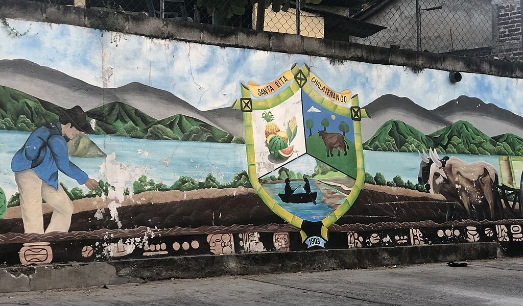A mural depicts village life at the entrance of the district of Santa Rita in Chalatenango, El Salvador, in a photo taken Dec. 22, 2022. (Wikimedia Commons/El Salvador)