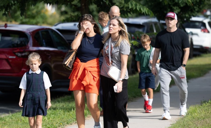 Families and loved reunite following a shooting at Annunciation Catholic School in Minneapolis Aug. 27, 2025. A shooter opened fire with a rifle through the windows of the school church and struck children celebrating Mass during the first week of school, killing two and wounding 17 people in an act of violence the police chief called “absolutely incomprehensible.” (OSV News/Dave Hrbacek, The Catholic Spirit)