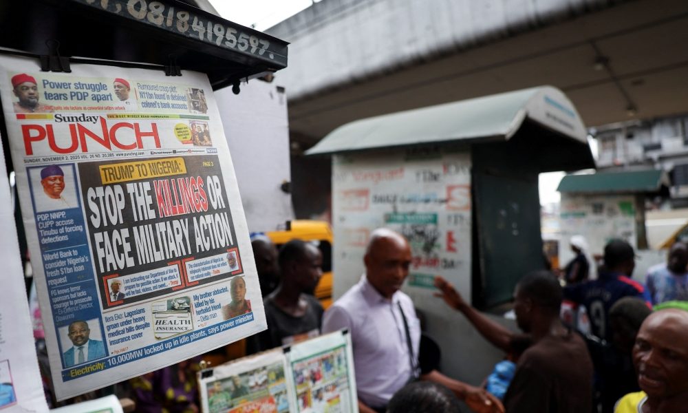 A newspaper with an article reporting U.S. President Donald Trump’s message to Nigeria over the treatment of Christians hangs at a newspaper stand in Ojuelegba, in Lagos state, Nov. 2, 2025. U.S. President Donald Trump said Oct. 31 he would designate Nigeria as a “country of particular concern” in response to violence in that country perpetuated against predominantly Christian communities. On Nov. 1, he threatened military action if that country’s government didn’t “move fast” to respond. (OSV News/Sodiq Adelakun, Reuters)