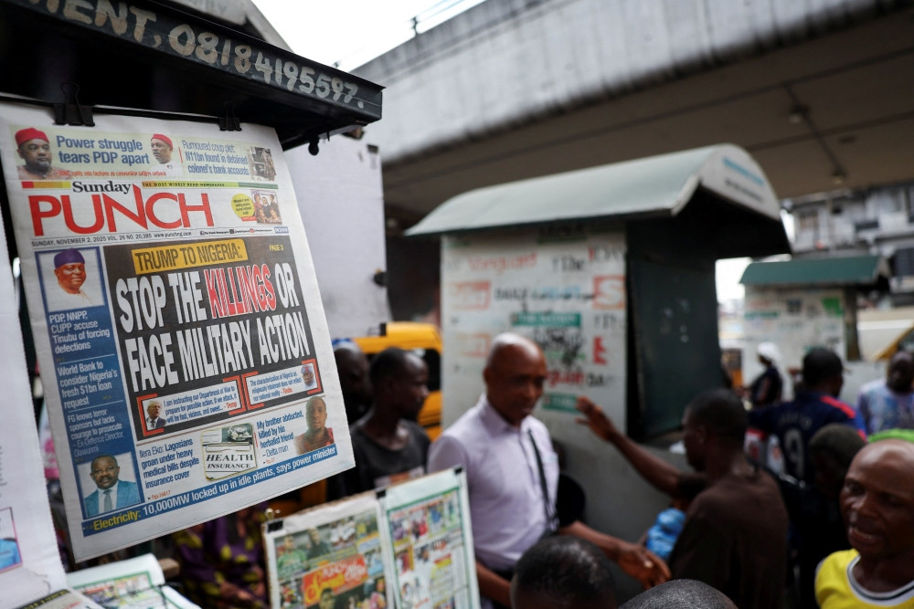 A newspaper with an article reporting U.S. President Donald Trump’s message to Nigeria over the treatment of Christians hangs at a newspaper stand in Ojuelegba, in Lagos state, Nov. 2, 2025. U.S. President Donald Trump said Oct. 31 he would designate Nigeria as a “country of particular concern” in response to violence in that country perpetuated against predominantly Christian communities. On Nov. 1, he threatened military action if that country’s government didn’t “move fast” to respond. (OSV News/Sodiq Adelakun, Reuters)