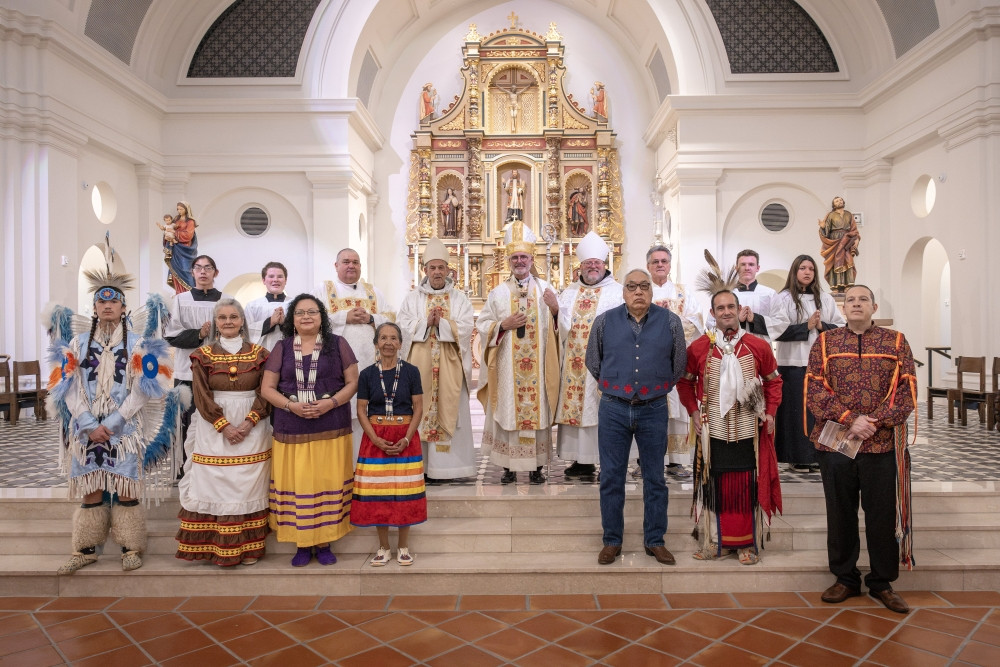 Archbishop Paul S. Coakley, center, Benedictine Abbot Lawrence Stasyszen of St. Gregory’s Abbey in Shawnee, Okla., at right of the archbishop, Benedictine Abbot Philip Anderson of Our Lady of Clear Creek Abbey in Hulbert in the Diocese of Tulsa, Okla., at left, stand with Deacon Roy Callison and Deacon Craig Victor, altar servers and lectors after the Native American Mass on Nov. 23, 2025, at the Blessed Stanley Rother Shrine in Oklahoma City. (OSV News/Chris Porter, Sooner Catholic)