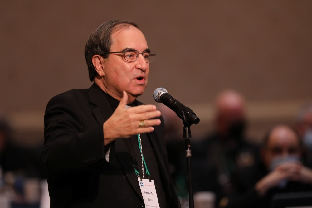 Bishop Michael G. Duca of Baton Rouge, La., speaks from the floor during a Nov. 17, 2021, session of the fall general assembly of the U.S. Conference of Catholic Bishops in Baltimore. Amid immigration detention sweeps in Louisiana, Bishop Duca issued a dispensation Dec. 4, 2025, from the obligation to attend Mass for those Catholics who are “rightfully afraid to participate in Mass because of their fear.” (OSV News/Bob Roller)