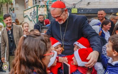 Cardinal Pierbattista Pizzaballa, Latin patriarch of Jerusalem, greets children as he visits the compound of Gaza City’s Holy Family Parish during his Christmas pastoral visit Dec. 19-21, 2025. He arrived prior to Christmas in a sign of closeness with a community that endured two years of war. (OSV News/Courtesy Latin Patriarchate of Jerusalem)