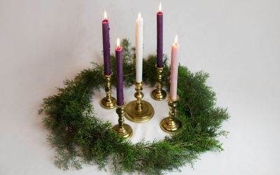 Advent candles, available in the public domain via Unsplash.
