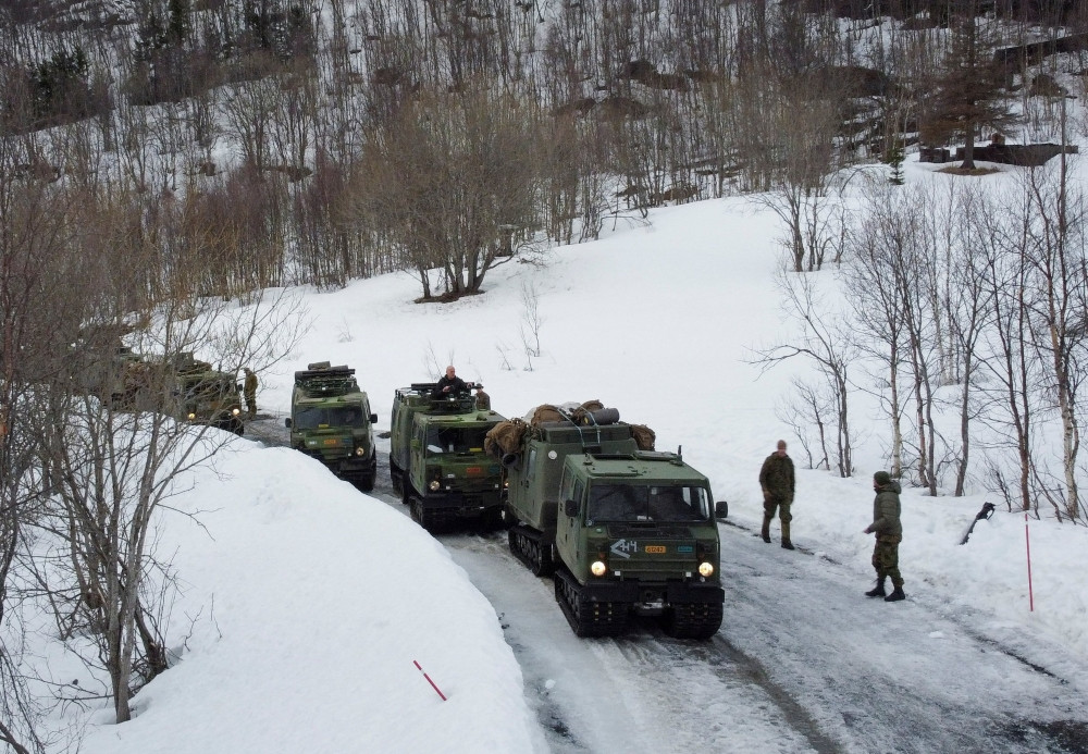 U.S. Marines participate in a military exercise called “Cold Response 2022,” gathering around 30,000 troops from NATO member countries plus Finland and Sweden, near Bjerkvik in the Arctic Circle, Norway, March 24, 2022, amid Russia’s invasion of Ukraine. (OSV News/Bart Biesemans, Reuters)