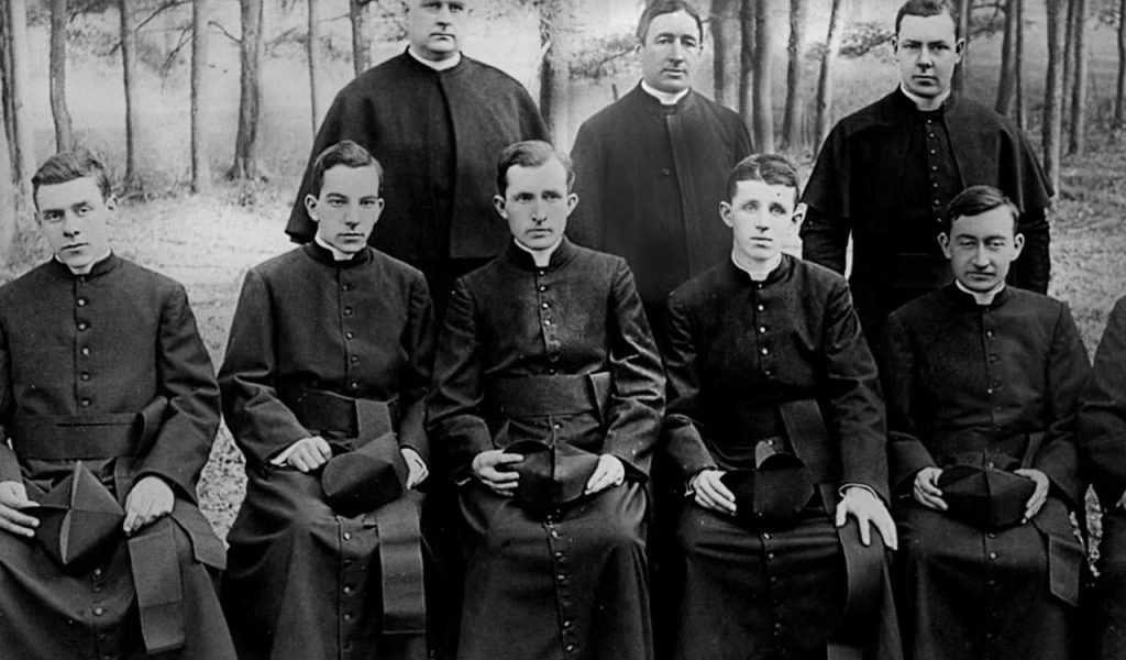 Group of Seminarians with Fr. Walsh. Back row left to right is: Fr. John I Lane, Fr. James A. Walsh, and an unnamed seminarian. Sitting left to right: Alphonse Vogel (left the Society), Francis Ford, Daniel McShane, James E. Walsh, William Lambert (left the Society), and William O'Shea