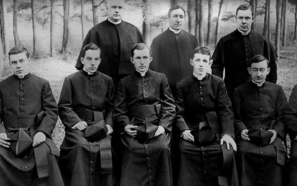 Group of Seminarians with Fr. Walsh. Back row left to right is: Fr. John I Lane, Fr. James A. Walsh, and an unnamed seminarian. Sitting left to right: Alphonse Vogel (left the Society), Francis Ford, Daniel McShane, James E. Walsh, William Lambert (left the Society), and William O'Shea