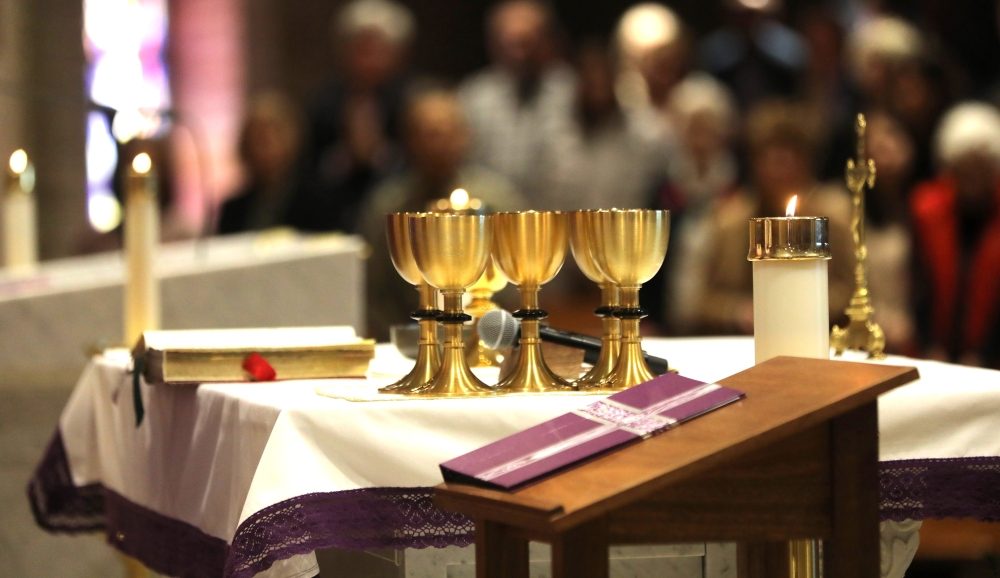 Communion chalices for reception of Holy Communion by the faithful rest on the altar during Mass at Sacred Heart Church in Prescott, Arizona, Dec. 10, 2023. (OSV News/Bob Roller)