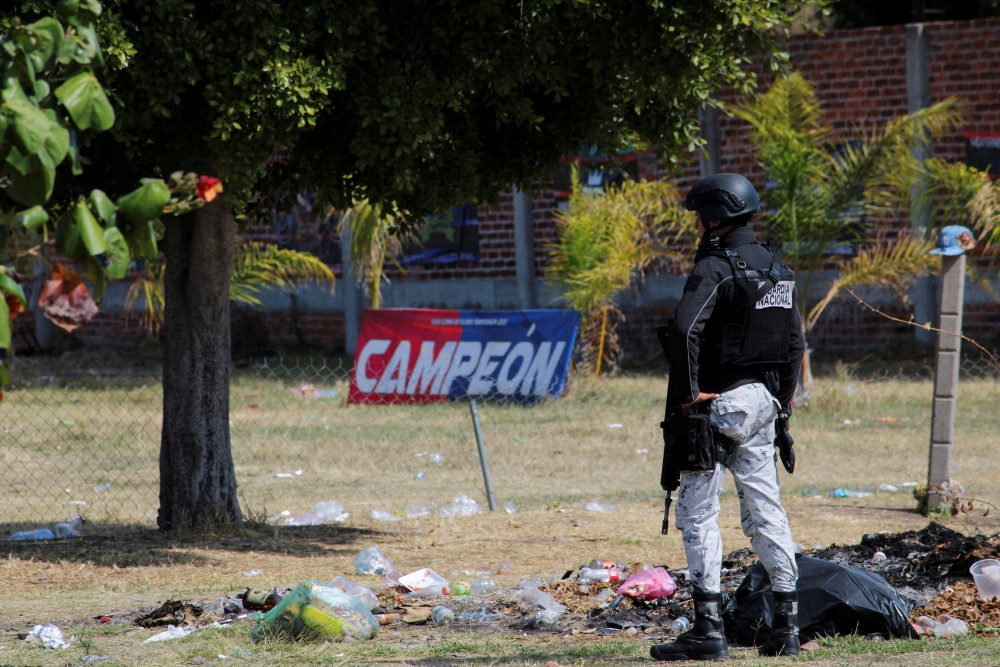 A member of the National Guard stands at a soccer field in the municipality of Salamanca, Mexico, Jan. 26, 2026, at the site where a group of armed attackers killed several people during a soccer match. Gunmen descended from two vehicles and opened fire on players and spectators at the recreational soccer match Jan. 25 in the community of Loma de Flores, according to local officials. (OSV News/Juan Moreno, Reuters)
