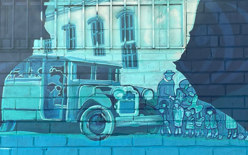 Maryknoll Brother Theophane Walsh is depicted serving as the parish school’s first bus driver. (Joseph Donovan/U.S.)