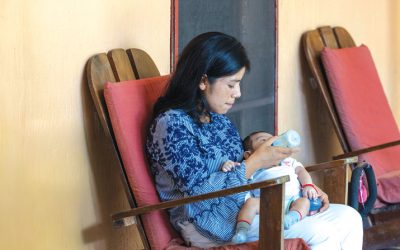 A young mother and her baby find a home at Hospicio Santa María, a home for HIV-positive and AIDS patients run by a Maryknoll sister and three Maryknoll affiliates. The hospice grounds include organic orchards and gardens, as well as an aviary. Located in the town of Pajapita in the department (state) of San Marcos, Guatemala, the property also houses the administrative offices of Project Life, an advocacy and educational organization that combats HIV/AIDS. (Octavio Durán/Guatemala)