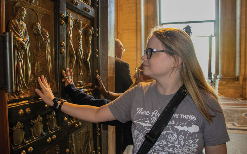 Lauren Pusich walks through the Holy Door at St. Peter’s Basilica. (Andrea Moreno-Díaz/Vatican City)