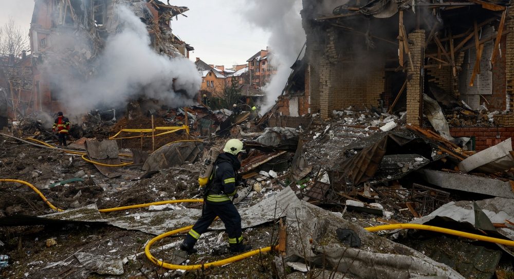 Firefighters work at the site of a residential building damaged during Russian drone and missile strikes in Kyiv, Ukraine, Feb. 22, 2026. (OSV News/Valentyn Ogirenko, Reuters)