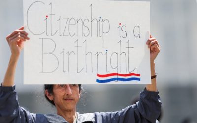 A demonstrator holds a placard during a protest outside the Supreme Court May 15, 2025, as the justices heard oral arguments in Trump v. CASA related to lower courts placing an injunction on Trump’s executive order of Jan. 20, 2025, to end birthright citizenship. In a 6-3 ruling, the Supreme Court June 27 limited the scope of federal courts to block presidential policies nationwide. On April 1, 2026, the court will hear oral arguments in Trump v. Barbara, a challenge to the order ending birthright citizenship. (OSV News/Leah Millis, Reuters)