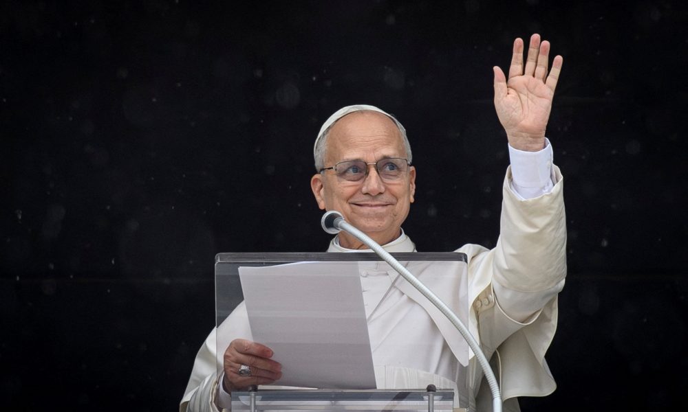 Pope Leo XIV waves as he leads the Angelus prayer from a window of the Apostolic Palace, at the Vatican, March 22, 2026. (OSV News/ Vatican Media, Matteo Pernaselci via Reuters)