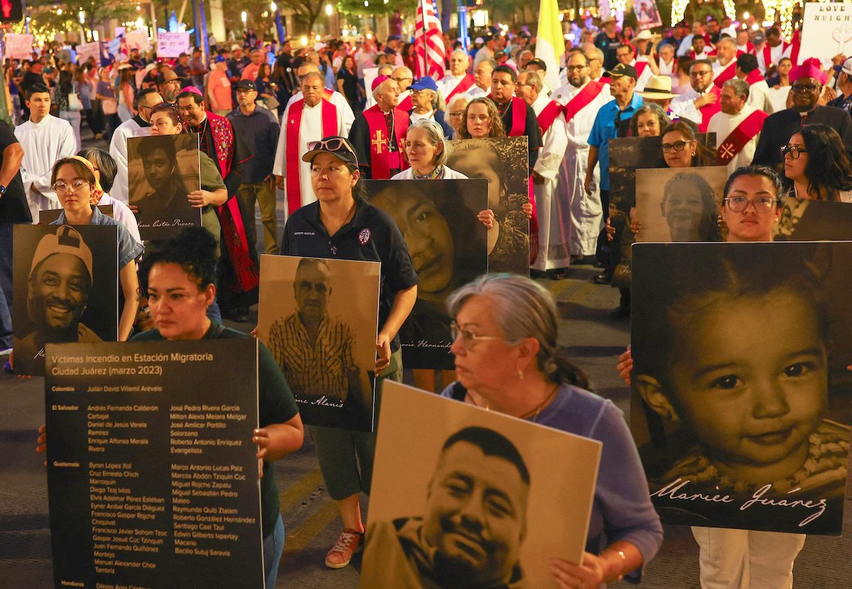 Catholics and other demonstrators hold placards with photographs and names of people who died in immigration-related circumstances as they take part in a protest in El Paso, Texas, March 24, 2026, against mass deportations and the immigration policies of the Trump administration. Bishop Mark J. Seitz of El Paso, center wearing a bishop’s skull cap, can be seen taking part in the the protest. (OSV News photo/Jose Luis Gonzalez)