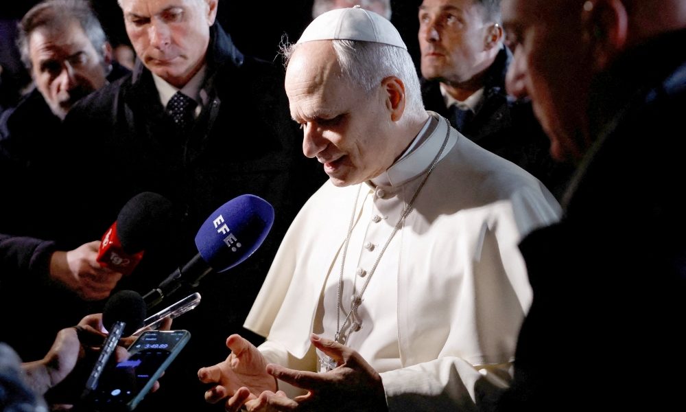 Pope Leo XIV speaks to the media before leaving the papal residence in Castel Gandolfo, Italy, March 31, 2026, to head back to the Vatican. Pope Leo called on world leaders, including President Donald Trump by name, to deescalate the war in the Middle East. (OSV News/Remo Casilli, Reuters)