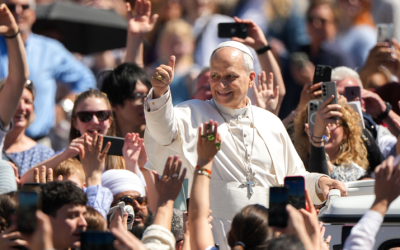 Pope Leo XIV greets people from the popemobile after appearing on the central balcony of St. Peter’s Basilica at the Vatican after Easter Mass April 5, 2026. (CNS/Lola Gomez)