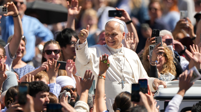 Pope Leo XIV greets people from the popemobile after appearing on the central balcony of St. Peter’s Basilica at the Vatican after Easter Mass April 5, 2026. (CNS/Lola Gomez)