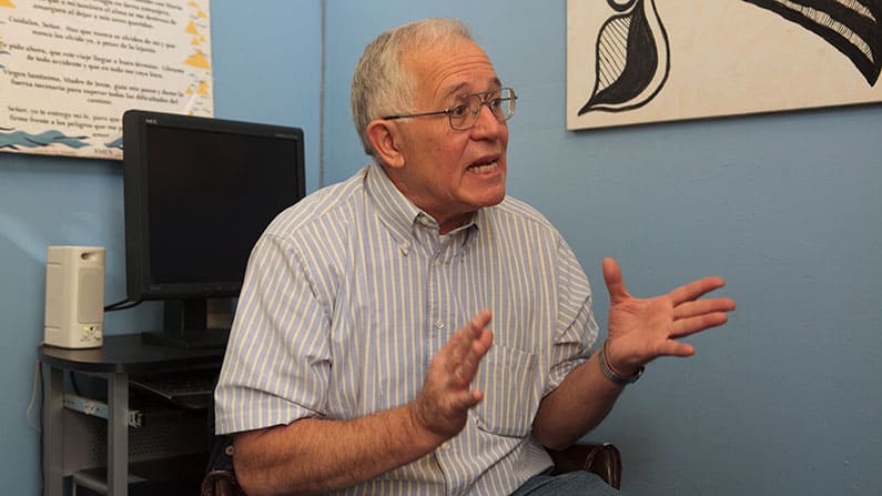 Ruben García, founder of the Annunciation House network for migrants in El Paso, Texas, describes the nonprofit’s mission in an interview with Maryknoll Magazine on Nov. 14, 2012. (Octavio Duran/U.S.)