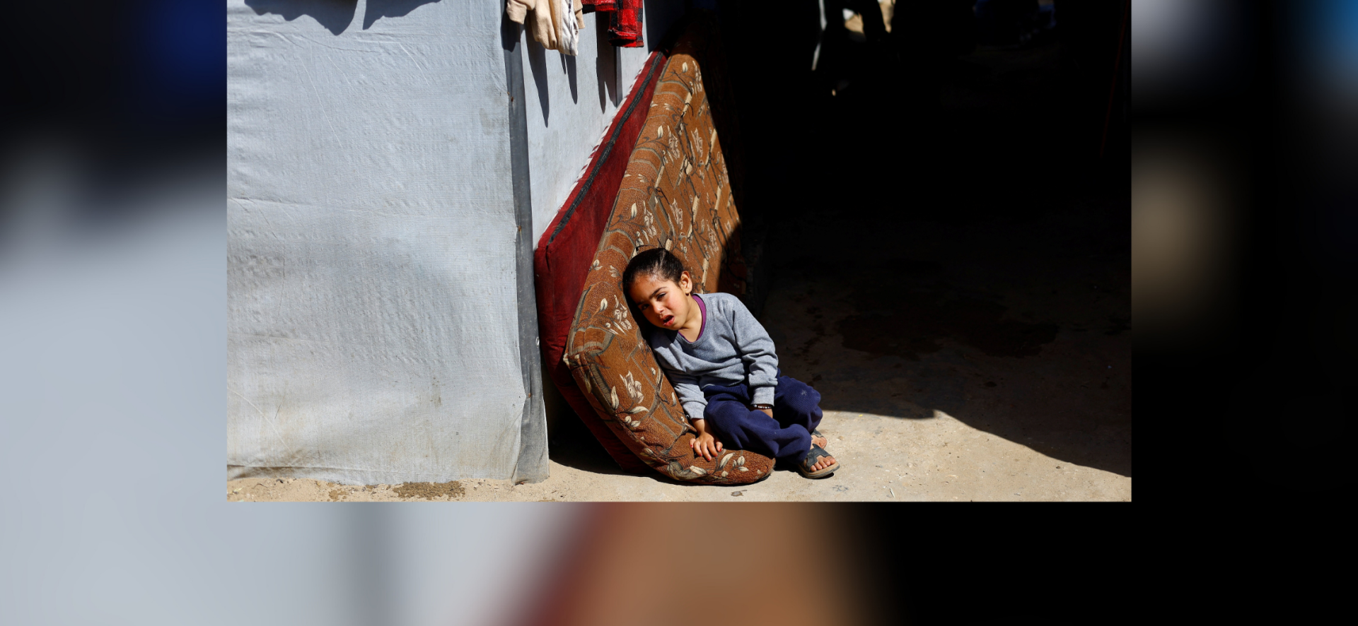 A child reacts March 11, 2026, in a tent camp in Deir al-Balah, in the central Gaza Strip. Large numbers of Palestinians continuously arrive in the refugee camp as Israel’s daily airstrikes and tank shelling continue to target what the Israel describes as Hamas infrastructure and militants, according to news reports. (OSV News/Mahmoud Issa, Reuters)