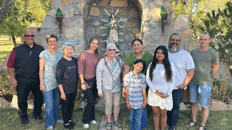 The Class of 2025, which included international members and a family with two children, undertook an eight-week orientation in El Paso. Texas. After their sending Mass and ceremony, during which they signed three-and-a-half-year covenants, the new missioners were sent to Bolivia, Brazil, Kenya, Tanzania, and the U.S.-Mexico border. From left to right: Victor Artaiz, Jana Schiemenz, Maria Corazón “Cora” Angeles, Susanne Beentjes, Dorothy Ritter, Elizabeth Canales Almanza, Ray Almanza and James Pawlowicz pose along with Siena and Solomon Almanza. (Daniel Lizárraga/U.S.)