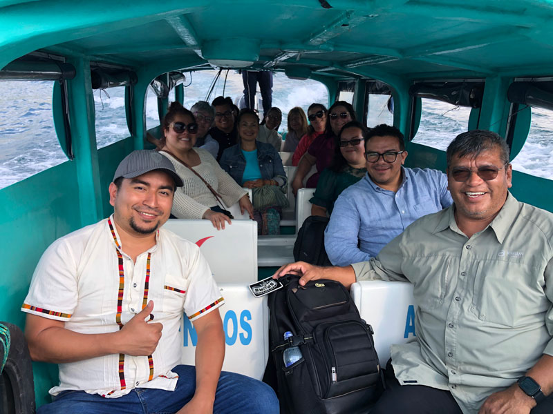 Maryknoll and CRS participants travel by boat to Santiago La Laguna on Lake Atitlán, Panajachel, Guatemala. (Leonel Yoque/Guatemala)