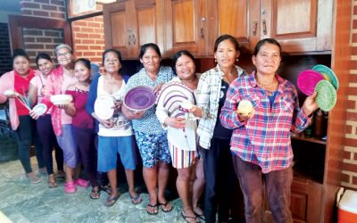 The Mojeño-Trinitarian women artisans of the Santísima Trinidad community in the Bolivian Amazon display their basketry pieces, which they sell to support their families. (Alejandro Marina/Bolivia)
