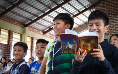 Children from the TIPNIS Indigenous community in the Bolivian Amazon sing joyfully during a Mass in the church of Santísima Trinidad, where Maryknoll missioners have served for several years and have recently been given pastoral responsibility for the parish.