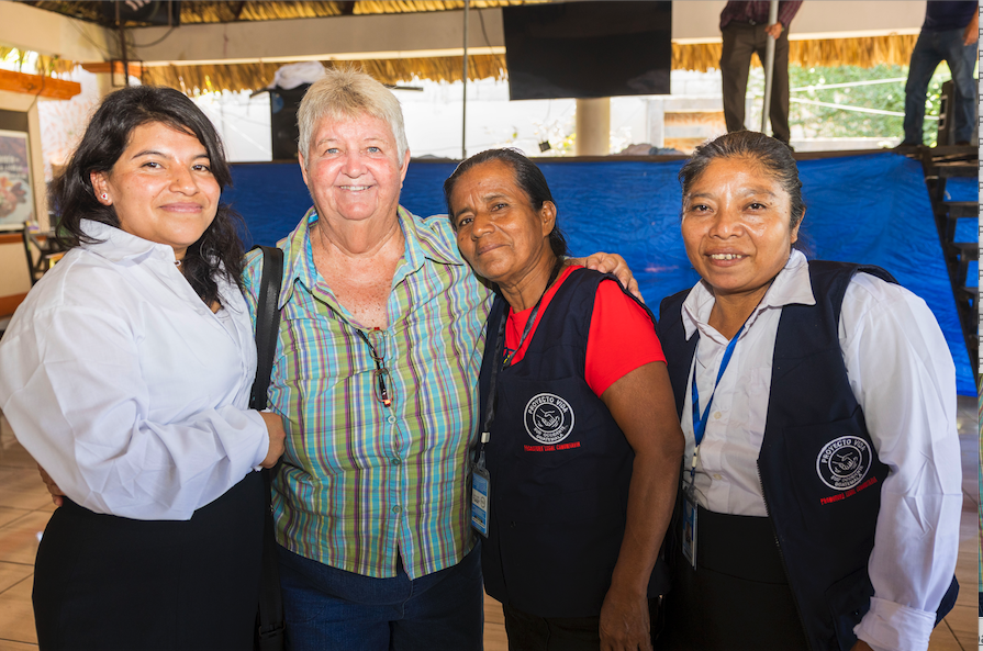 Maryknoll Sister Delia Marie Smith (second from left) congratulates graduates of a training program for community legal promoters in Pajapita, San Marcos, Guatemala, on August. 15, 2024. The promoters, trained by Sister Smith and the staff of an HIV/AIDS prevention and treatment program she founded, will serve in their communities to support victims of domestic violence, HIV/AIDS patients and people experiencing discrimination. (Octavio Durán/Maryknoll magazine/Guatemala)