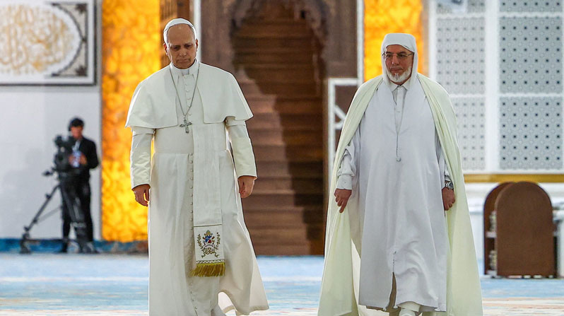 Pope Leo XIV and Rector of the Great Mosque of Algiers Mohammed Al-Mamoun Al-Qasimi Al-Hassani walk together during a visit to the Great Mosque of Algiers (Djamaa El Djazair), in Mohamadia, Algiers, Algeria, April 13, 2026. (OSV News/Guglielmo Mangiapane, Reuters)