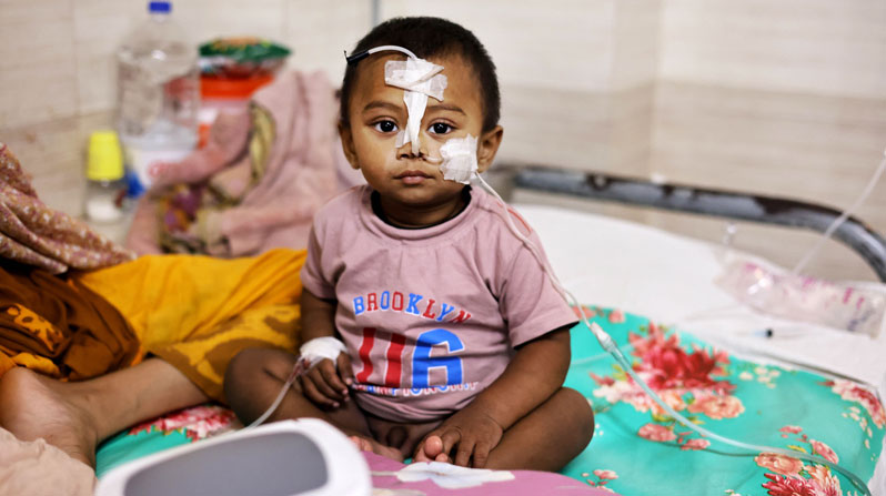 Marsalain, 15 months, who has been suffering from measles for a month, sits in his bed at the Children’s Hospital in Dhaka, Bangladesh, May 8, 2026. Catholic Charity Caritas Bangladesh and Church-run health centers are building awareness among the rural people while the country grapples with a deadly outbreak of measles that has left more than 336 children dead since mid-March. (OSV News/Stephan Uttom Rozario)