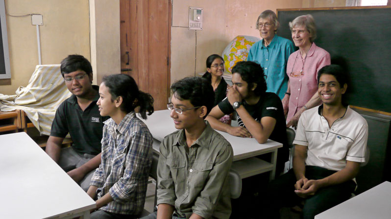 Maryknoll Sisters Miriam Francis Perlewitz (pink blouse) and late Joan Cordis Westhues (blue blouse), cofounders of BACHA, are shown with adolescent students in 2009. (Sean Sprague/Bangladesh)