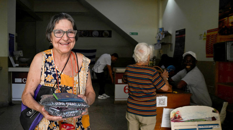 Lourdes Martínez, 78, smiles after receiving beans at a subsidized state store in Havana March 6, 2026, donated by Mexico. Catholic Relief Services, the humanitarian and development agency of the U.S. Catholic bishops, has received $60 million from the U.S. State Department to expand humanitarian assistance to vulnerable families across Cuba. (OSV News/Norlys Perez, Reuters)