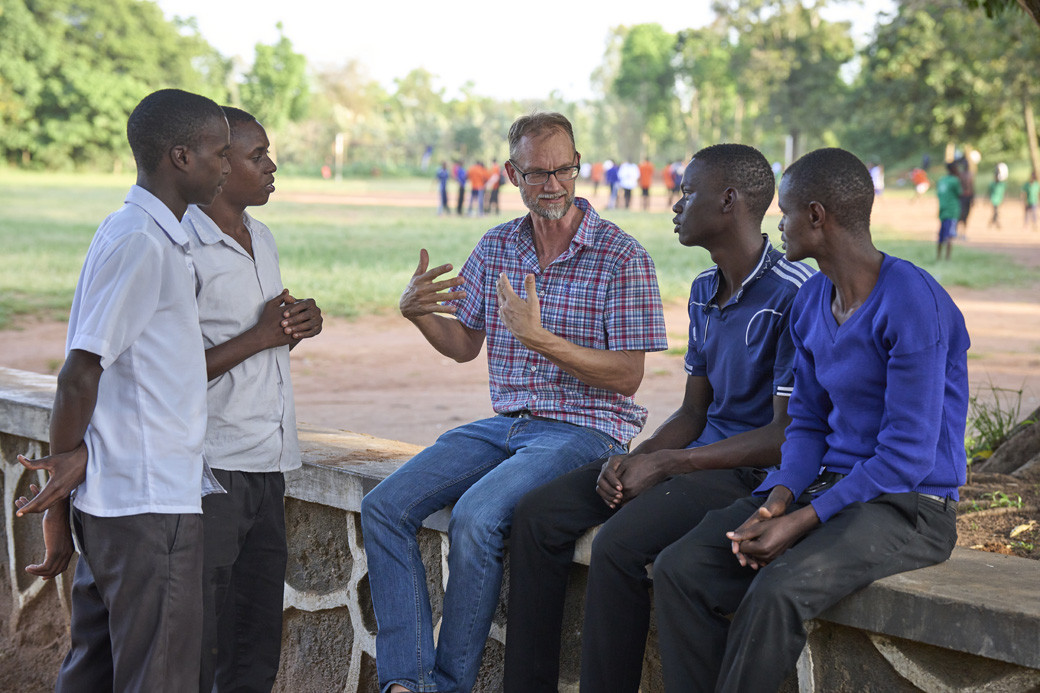 Steve Veryser engages with deaf students at Bwiru Boys Technical School in Mwanza, Tanzania, where he teaches mathematics. He also manages the Lake House of Prayer, a contemplative retreat center on the shores of Lake Victoria.​ (Paul Jeffrey/Tanzania)
