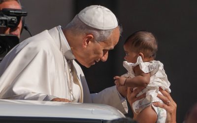 Pope Leo XIV greets a child from the popemobile while riding around St. Peter’s Square at the Vatican before his weekly general audience Sept. 2, 2026. (CNS/Lola Gomez)