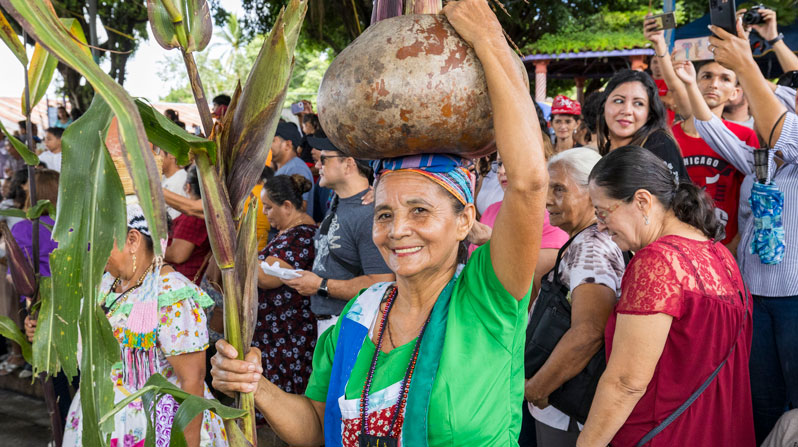 A member of a folkloric dance group celebrates the harvest during the annual Corn Festival held at Dulce Nombre de María parish in the department of Chalatenango, El Salvador, where many Maryknoll missioners have served. (Octavio Durán/El Salvador)