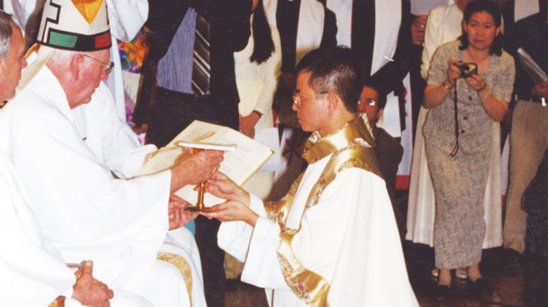 Lo Xuan Dam is ordained at Our Lady Queen of Apostles Chapel, at the Maryknoll Society’s headquarters in Ossining, New York, on June 10, 2000, by Archbishop Francis Hurley of Anchorage, Alaska. (John Argauer/U.S.)