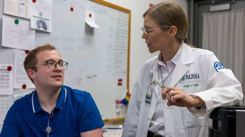 At Rush Medical Center, Chaplain Gordon hands off the day shift to Sister Shideler. Spiritual accompaniment is her “best response” to God’s call. (Octavio Durán/U.S.)