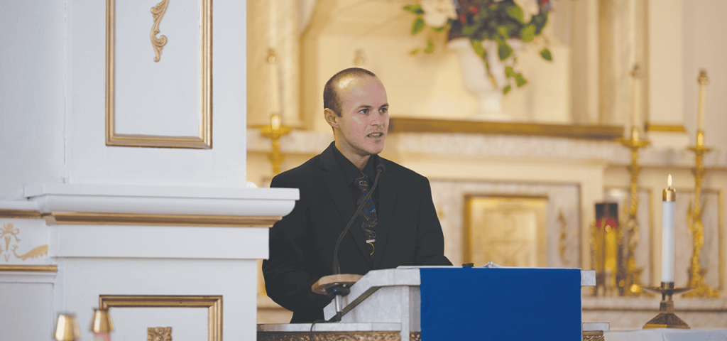 James Pawlowicz sirve como lector durante la Misa y ceremonia de envío. (José García/EE. UU.)