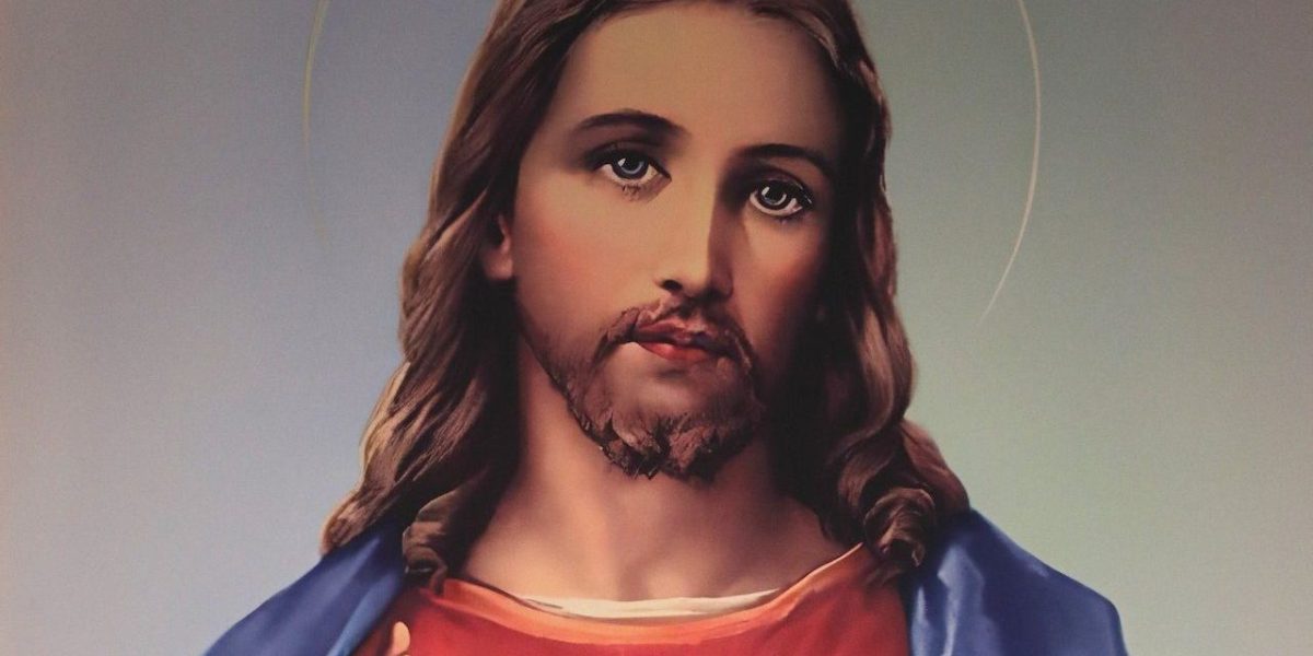 Una pintura del Sagrado Corazón de Jesús durante la Misa del Domingo de Ramos en la Iglesia del Sagrado Corazón en Prescott, Arizona, el 13 de abril de 2025. (OSV News/Bob Roller)
