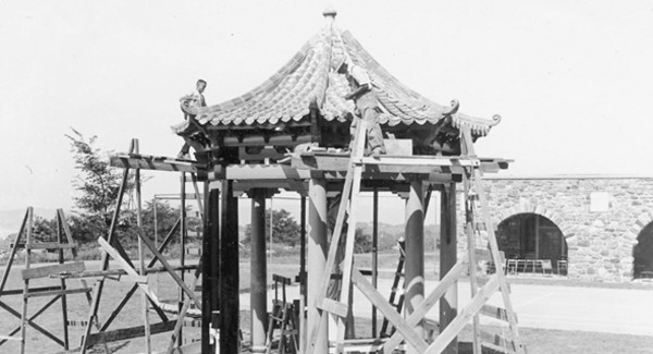 Artisans constructing a pagoda in the Asian style at the Maryknoll Society campus in Ossining, NY.