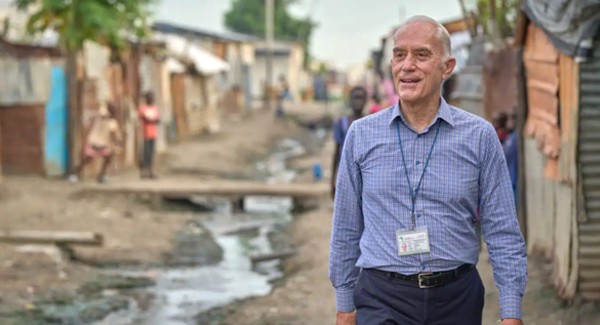 Fr Mike Bassano walking in the in the UN camp in Malakal, Sudan. He served the people of South Sudan for more than ten years, remaining close to displaced people even in the darkest and most difficult moments.